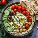 Greek Style Loaded Hummus is not just a dish; it's a celebration of flavors, textures, and the rich culinary heritage of Greece. This delightful spread combines the classic elements of traditional hummus with the vibrant ingredients synonymous with Greek cuisine, making it a perfect appetizer or snack for any occasion. Hummus, with its creamy texture and nutty flavor, has gained immense popularity worldwide, thanks to its versatility and health benefits.